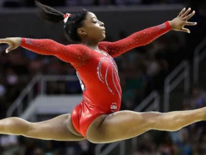 Simone Biles: Breaking Barriers, Defying Gravity, and Inspiring Hearts in Gymnastics